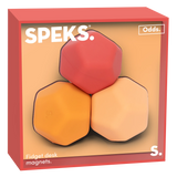 Three polygonal fidget desk magnets in a box. The magnets are red, orange, and peach, set against a soft background. The box has a modern, playful design.