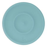 Circular light green silicone sensory sticker with smooth, concentric ridge design.