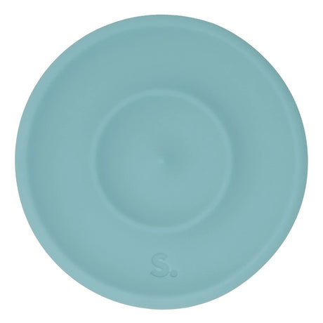 Circular light green silicone sensory sticker with smooth, concentric ridge design.
