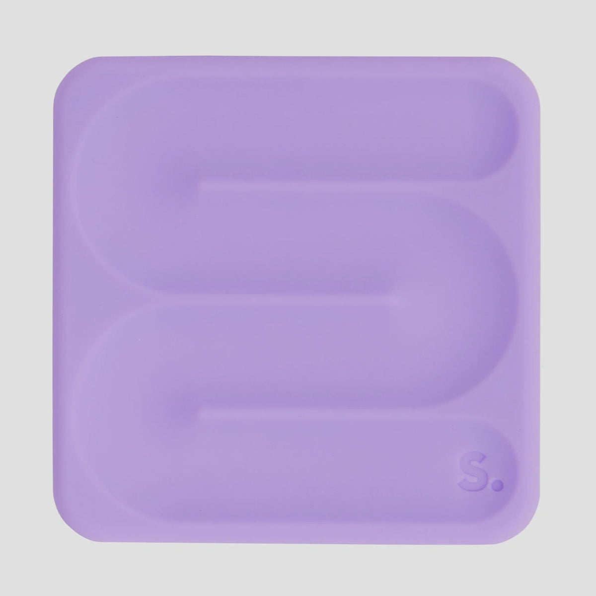 Square lavender silicone sensory sticker with a smooth S-shaped grooved path and "S." logo.