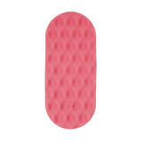 Oval pink silicone sensory sticker with a mesh dimpled texture and an "S." logo near the bottom.