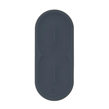 Oval dark grey silicone sensory sticker with a smooth, indented path design.