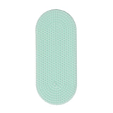 Oval light green silicone sensory sticker featuring a fine, bumpy textured surface.