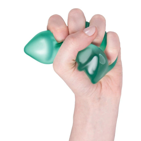 Front view of a hand tightly squeezing a green silicone Speks tree fidget toy.