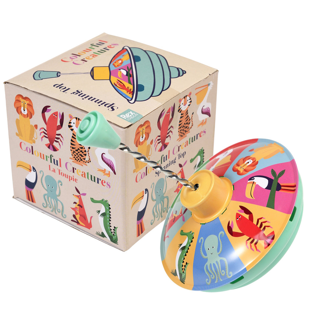 A colorful spinning top featuring playful animal designs, next to its illustrated box titled "Colourful Creatures."