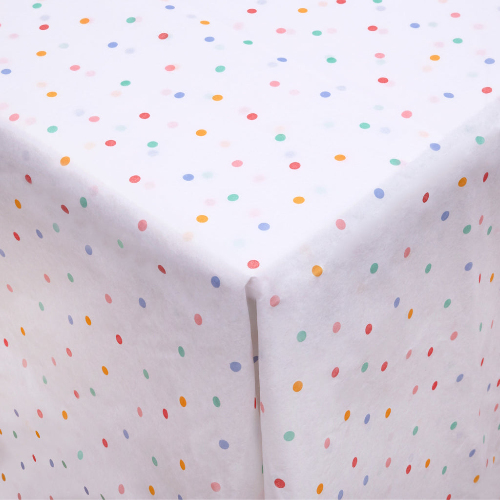 Featuring a white background with colourful spots, perfect for brightening up party tables with a playful touch.