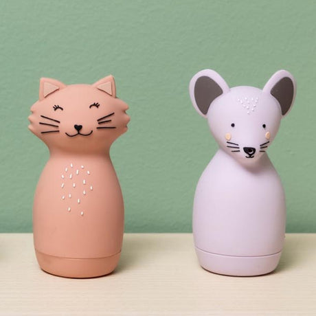 Pink cat and purple mouse silicone squeezy animal toys for kids on a wooden surface.