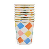 Stack of Meri Meri colorful diamond pattern paper cups with gold foil rims, perfect for birthday party tableware.