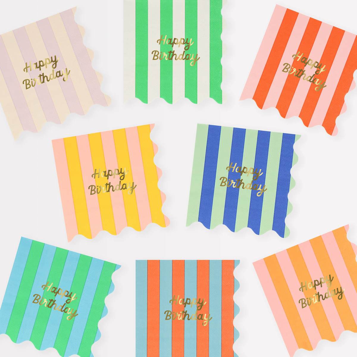 Colorful assortment of striped birthday napkins with gold foil text and scalloped edges.