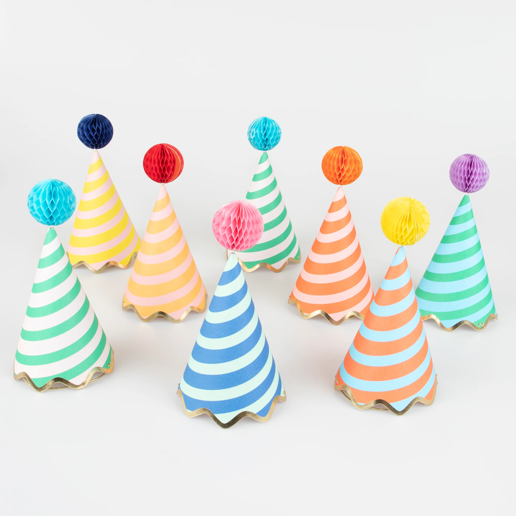 A set of colorful cone-shaped hats with bold stripe patterns and pom-pom tops, perfect for festive celebrations.