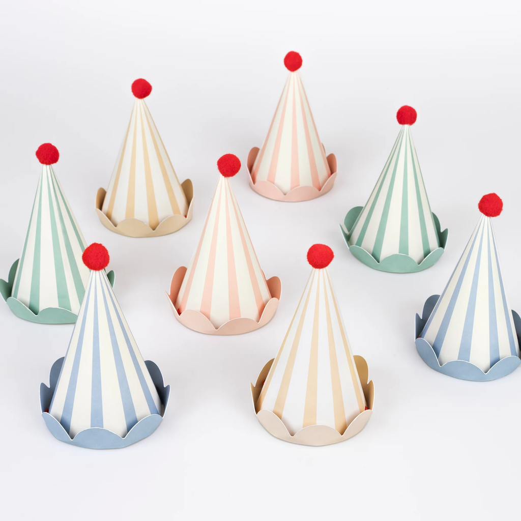 A set of cone-shaped hats with soft pastel stripes and pom-pom tops, ideal for birthdays and spring celebrations.