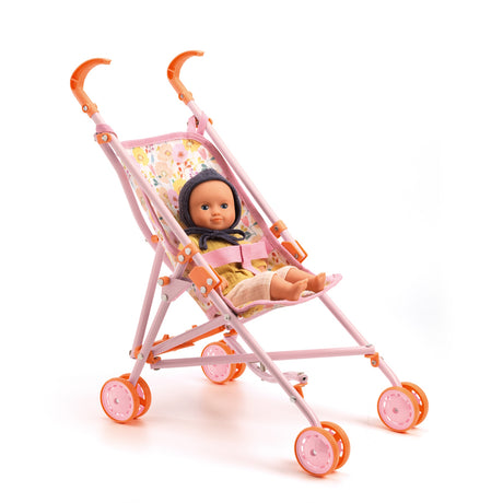 Pink toy doll stroller with floral seat and small baby doll on a white background.