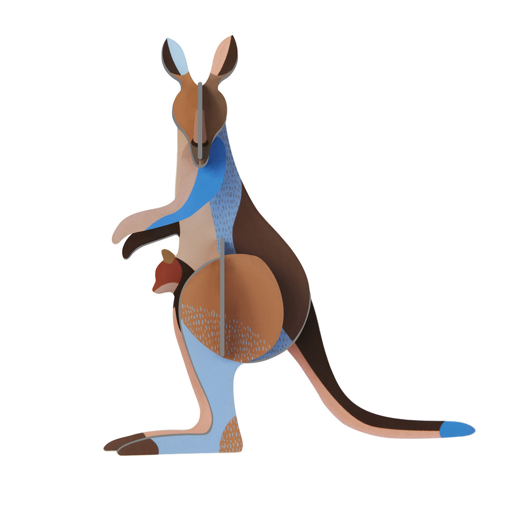 Stylized, colorful kangaroo cutout art with geometric shapes and patterns in blues, browns, and oranges, featuring a joey in its pouch.