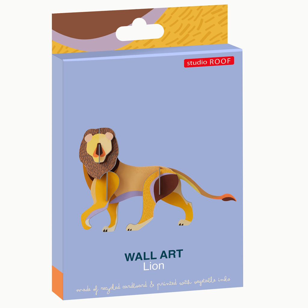 Packaging for lion wall art by Studio Roof. Features a colorful, layered paper lion on a light blue background. Made from recycled cardboard.