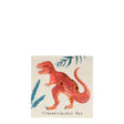 Meri Meri Dinosaur Kingdom napkin featuring an orange Tyrannosaurus Rex with gold foil details and blue ferns.
