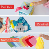 Infographic showing play options for Taf Toys Kimmy Koala Wonder Tissue Box: pull out, crinkle, and name colors.