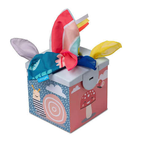 Illustrated toy tissue box with colorful sensory fabric scarves sticking out of the top slot.