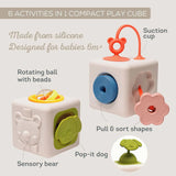 Infographic showing a silicone 6-in-1 baby activity play cube with interactive sensory features.