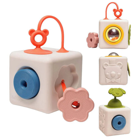 Multisensory baby activity cube toy featuring a teether handle, spinning wheel, peek-a-boo flower, and rattle.
