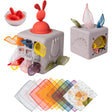 Taf Toys sensory tissue box toy with a bunny pop-up topper and colorful organza scarves.