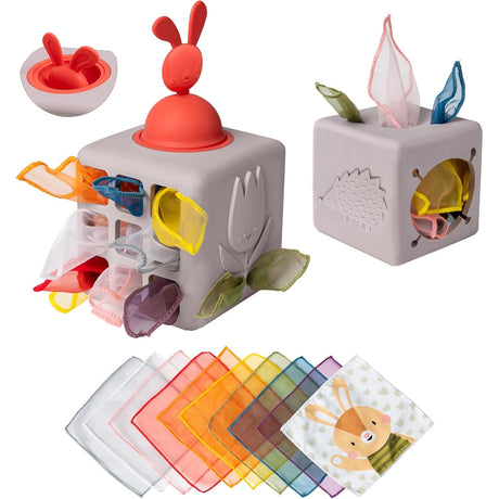 Taf Toys sensory tissue box toy with a bunny pop-up topper and colorful organza scarves.