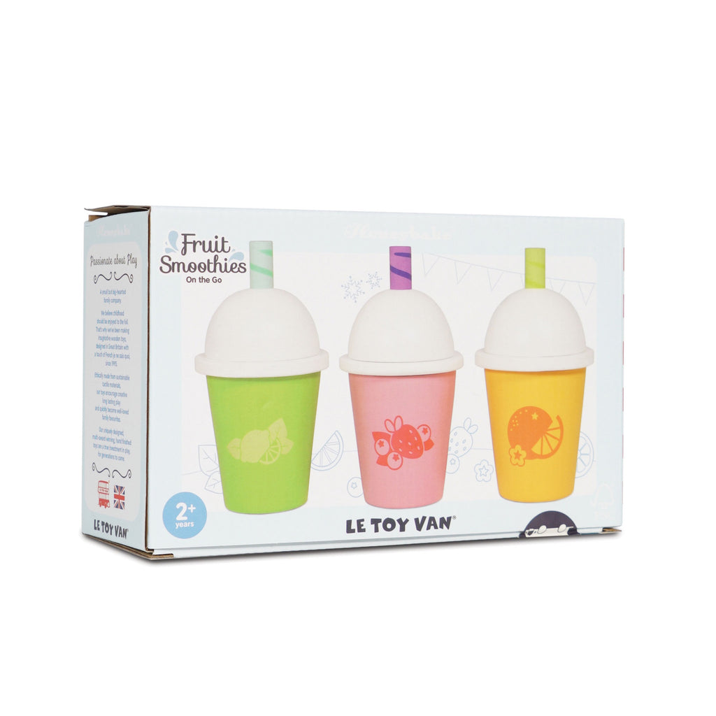 Fruit Smoothies on the Go set packaging featuring three colorful cups with fruit designs: green with limes, pink with strawberries, and yellow with oranges. Playful and vibrant.