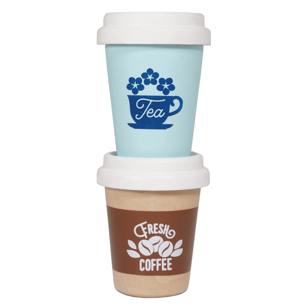 Two small toy cups with white lids: one wooden with "Fresh Coffee" text and beans in brown; the other mint green with "Tea" and a cup design. Playful tone.