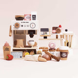 Le Toy Van wooden play coffee machine and cafe setup with play treats, register, and coffee cup.