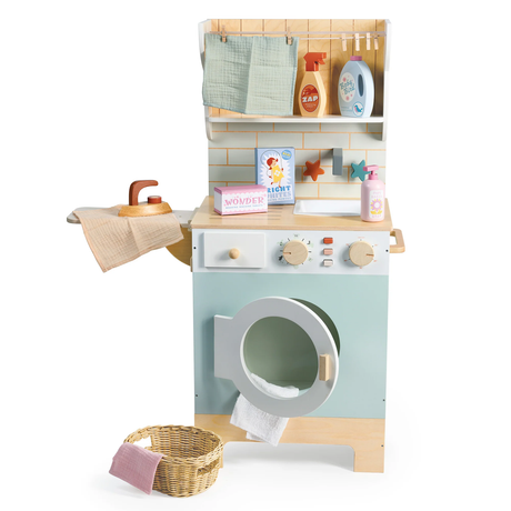Wooden play laundrette set with a front-load washer, side ironing board, and play accessories.