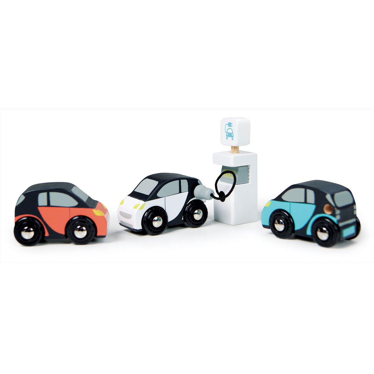Three toy cars in orange, white, and blue, with the white car plugged into an EV charging station.