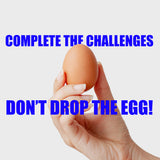 A hand holding a brown egg with blue text reading "Complete the challenges, don't drop the egg!".