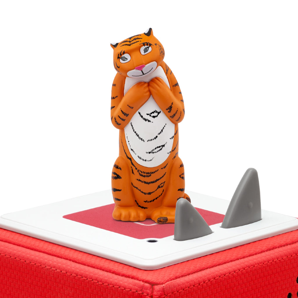 A playful orange tiger figurine, exuding a whimsical and cheerful vibe.