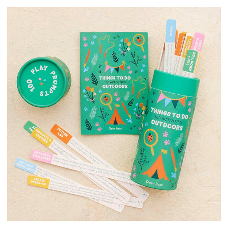 Green "100 Activities Outdoors" container, guidebook, lid, and activity sticks on a neutral surface.