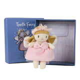 Small plush tooth fairy doll in a pink dress standing in front of an open blue gift box.