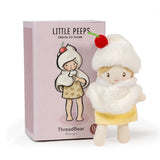 Small "Little Peeps Cherry Ice Cream" plush doll standing next to its pink illustrated box.