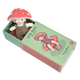 "Tommy Toadstool" doll sitting inside its green matchbox-style packaging.