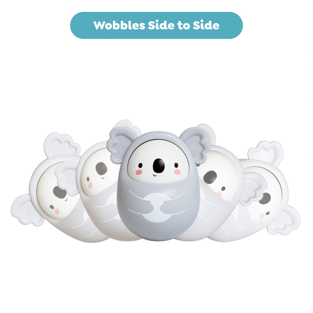 Cute, cartoonish koala-shaped toy with chubby cheeks, showing its ability to wobble side to side. Text above reads “Wobbles Side to Side.”