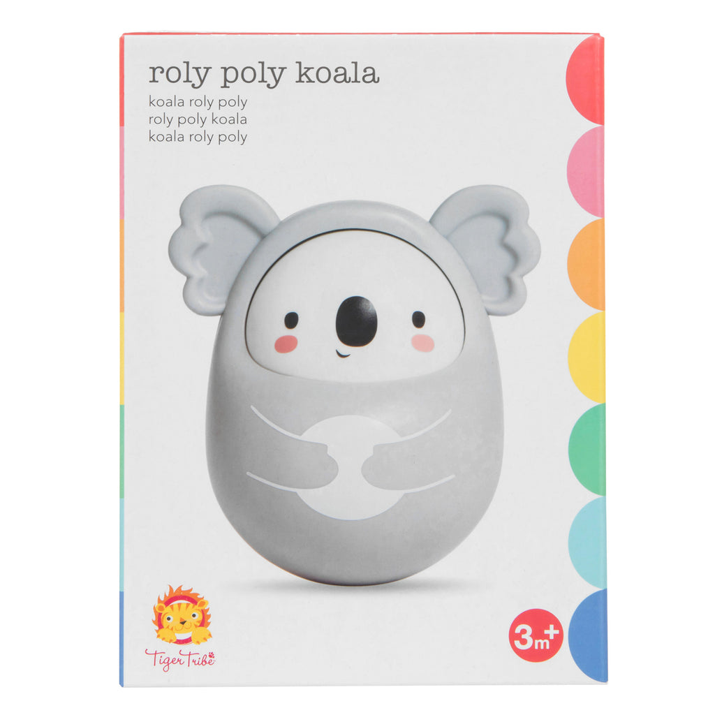 Packaging for a 'roly poly koala' toy, featuring a cute, gray koala with round ears and a smiling face. Suitable for ages 3 and up.