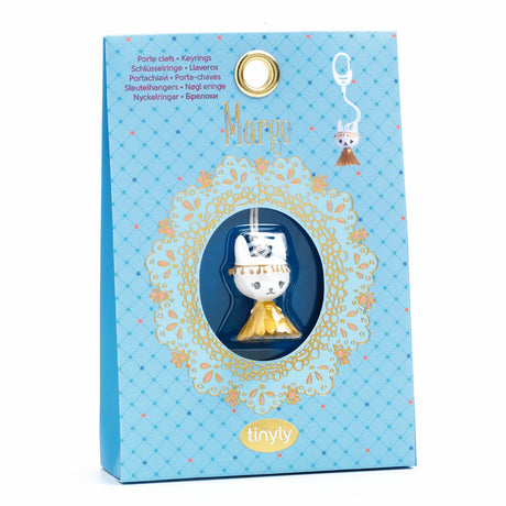 The Margo Tinyly Key Ring by Djeco is a delightful accessory featuring a finely sculpted pendant of Margo, an adorable kitten character from Djeco's Tinyly collection.