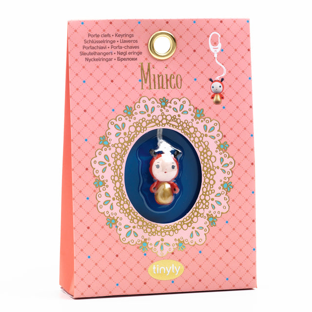 A keyring from Djeco's Tinyly collection featuring a finely sculpted figurine of Minico, a ladybug character.