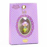 A colorful necklace featuring a finely sculpted figurine of Tutti, a character from Djeco's Tinyly collection.