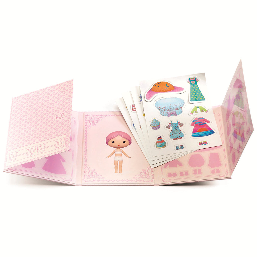 The set includes a cardboard booklet with a central illustration of Miss Lilypink and four sheets of reusable vinyl stickers, allowing children to dress and accessorize her in various outfits.