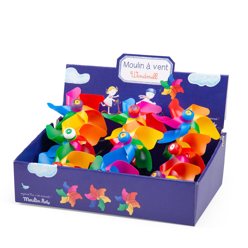Box of colorful toy pinwheels labeled "Moulin à vent," with playful illustrations of children. Bright, cheerful design, evokes a sense of fun.
