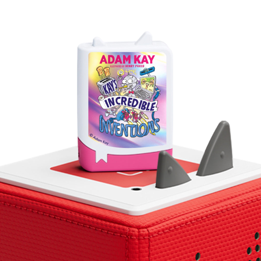 A colorful children's audio book titled 'Kay's Incredible Inventions' by Adam Kay sits on a red speaker with tactile controls. The cover features whimsical illustrations of inventions, including a robot and a laptop, set against a vibrant purple and blue background. The tone is playful and imaginative.