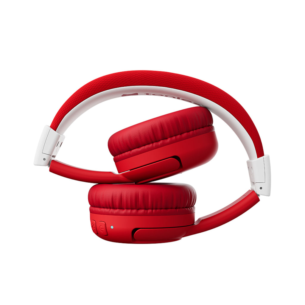 Red and white children’s headphones with a playful design. The red ear cups feature a light-up cat-like logo, USB port, and buttons below.