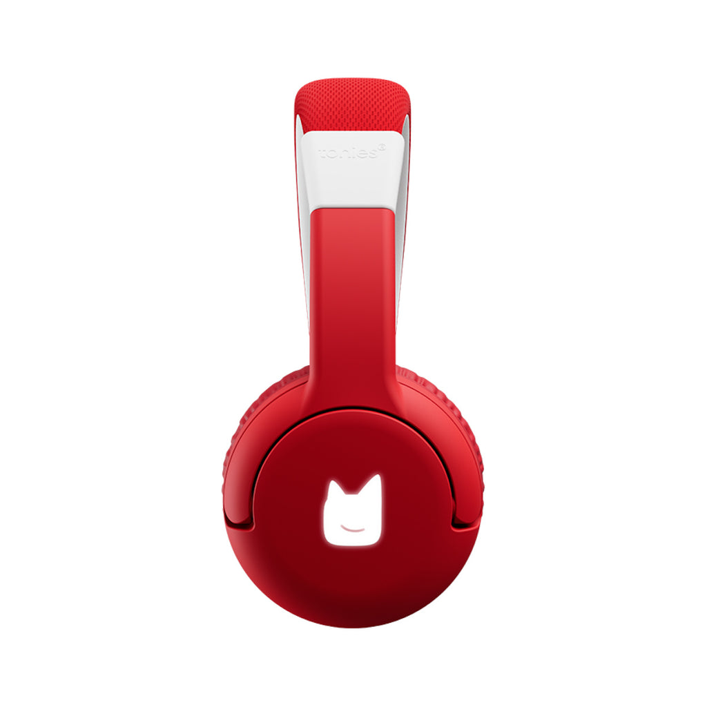Red and white children’s headphones with a playful design. The red ear cups feature a light-up cat-like logo, USB port, and buttons below.