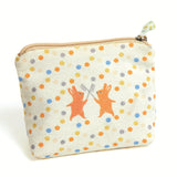 Small canvas coin purse with colorful polka dots and two dancing rabbits illustration.