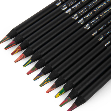 Set of 12 Tout Autour du Monde multicolored pencils with black wood barrels and rainbow cores on a white background.