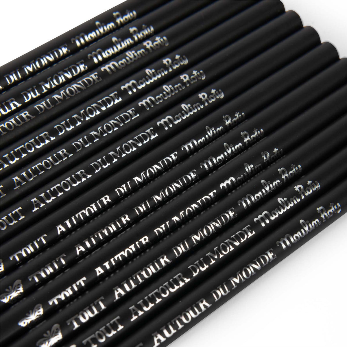 Close-up of black Moulin Roty Tout Autour du Monde pencils featuring silver foil lettering and butterfly logo.