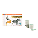 Moulin Roty animal lotto game featuring Africa themed cards and round illustrated tokens on a white background.